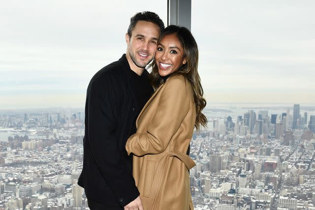 Dimitrios Kambouris/Getty (L-R) Tayshia Adams and Zac Clark pose for a photo together.