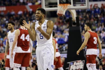 Kentucky&#39;s Andrew Harrison (5) reacts during the first half of Saturday night's loss to Kentucky. (AP)