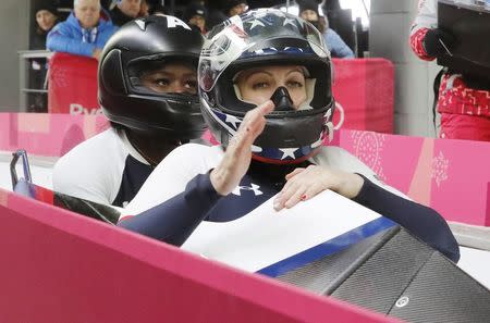 Bobsleigh - Pyeongchang 2018 Winter Olympics - Women's Finals - Olympic Sliding Centre - Pyeongchang, South Korea - February 21, 2018 - Jamie Greubel Poser and Aja Evans of U.S. react. REUTERS/Arnd Wiegmann