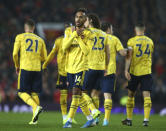 Arsenal's Pierre-Emerick Aubameyang celebrates after scoring the opening goal during the English Premier League soccer match between Manchester United and Arsenal at Old Trafford in Manchester, England, Monday, Sept. 30, 2019. (AP Photo/Dave Thompson)