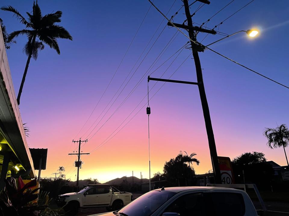 The sunset from the parking lot at The Mena Creek Hotel.