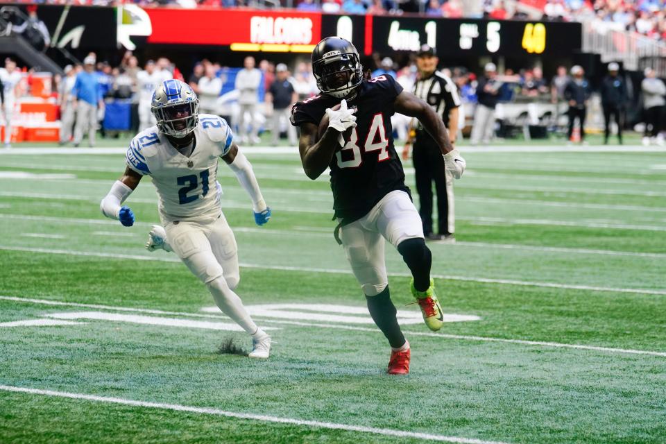 Atlanta Falcons running back Cordarrelle Patterson (84) runs into the end zone for a touchdown against the Detroit Lions during the first half Sunday, Dec. 26, 2021, in Atlanta.