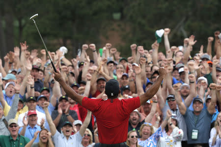 Golf - Masters - Augusta National Golf Club - Augusta, Georgia, U.S. - April 14, 2019 - Tiger Woods of the U.S. celebrates on the 18th hole after winning the 2019 Masters. REUTERS/Mike Segar