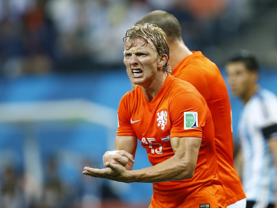 Kuyt of the Netherlands reacts during their 2014 World Cup semi-finals against Argentina at the Corinthians arena in Sao Paulo