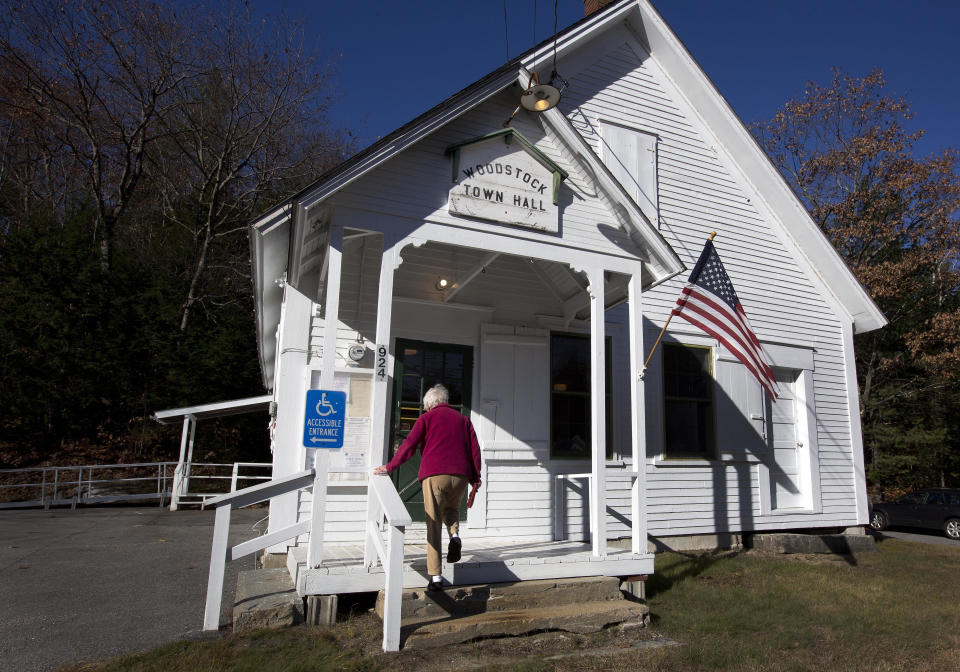 A voter arrives to vote at the town hall on Nov. 8, 2016, in Woodstock, N.H. (Photo: Jim Cole/AP)