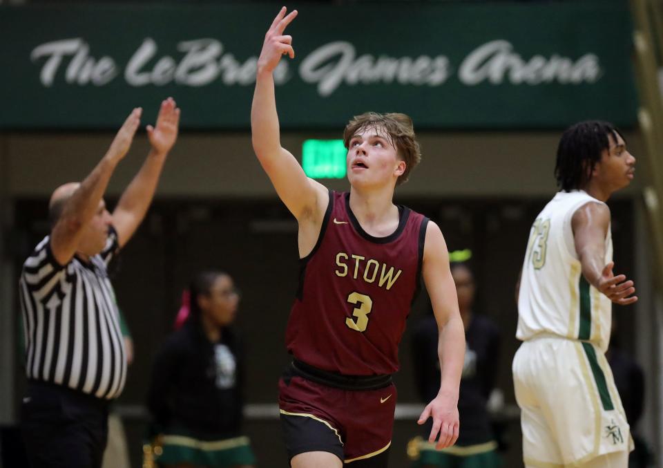 Stow's Cam Marconi celebrates after making a three during the first half of a high school basketball game against STVM, Tuesday, Jan. 30, 2024, in Akron, Ohio.