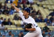 May 23, 2018; Los Angeles, CA, USA; Los Angeles Dodgers starting pitcher Kenta Maeda (18) pitches against the Colorado Rockies in the first inning at Dodger Stadium. Mandatory Credit: Richard Mackson-USA TODAY Sports