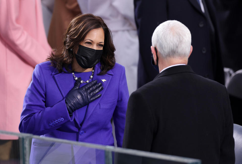 Vice President-elect Kamala Harris greets Vice President Mike Pence as she arrives to the inauguration on the West Front of the U.S. Capitol.<span class="copyright">Alex Wong—Getty Images</span>