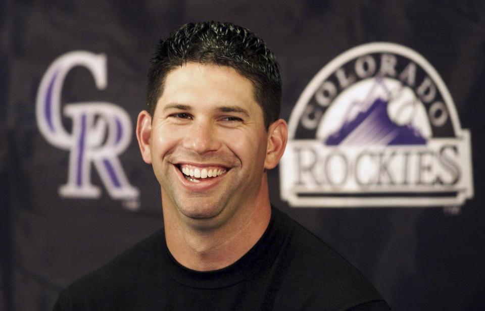 FILE - Colorado Rockies first baseman Todd Helton smiles as he talks about his nine-year contract extension announced by the team, Thursday, March 29, 2001, in Tucson, Ariz. Helton, Billy Wagner and Scott Rolen are leading contenders to be elected to baseball's Hall of Fame in the Baseball Writers' Association of America vote announced Tuesday, Jan. 24, 2023. (AP Photo/Ted S. Warren, File)