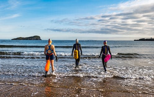   <span class="attribution"><a class="link " href="https://www.alamy.com/wild-or-open-water-women-swimmers-wearing-wetsuits-with-buoyancy-floats-enter-the-firth-of-forth-sea-north-berwick-east-lothian-scotland-uk-image416629506.html?imageid=FCA7E8A4-6ACE-4DCC-94AB-64CDB9B6F5C2&p=373051&pn=1&searchId=bf5dfdc822516e443cf4c25d554e4dd2&searchtype=0" rel="nofollow noopener" target="_blank" data-ylk="slk:Sally Anderson/Alamy Stock Photo;elm:context_link;itc:0;sec:content-canvas"> Sally Anderson/Alamy Stock Photo</a></span>