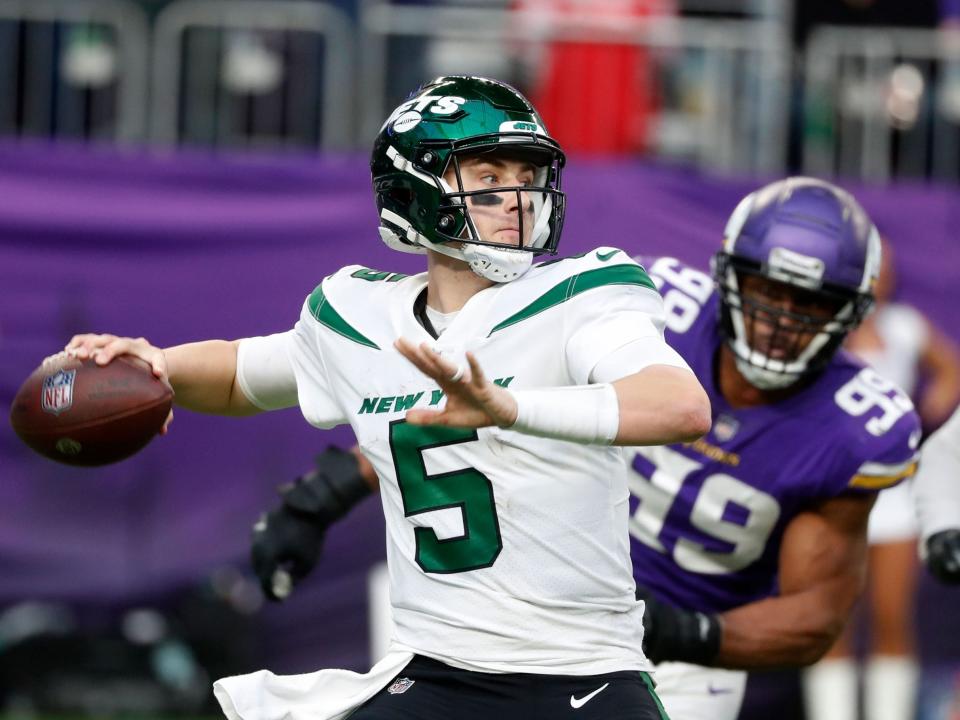 Mike White throws a pass against the Minnesota Vikings.