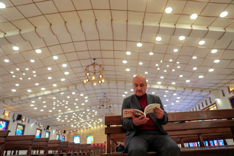 Thanoun Yahya, a 59 year-old an Iraqi Christian from the city of Mosul is seen at al-Bishara church in Mosul