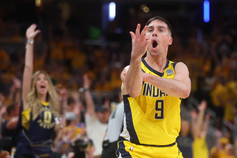 INDIANAPOLIS, INDIAN - MAY 25: TJ McConnell #9 of the Indiana Pacers celebrates a three-pointer against the Boston Celtics during the fourth quarter of Game 3 of the Eastern Conference Finals at Gainbridge Fieldhouse on May 25, 2024 in Indianapolis, Indiana .  NOTE TO USER: User expressly acknowledges and agrees that by downloading and/or using this photograph, User is agreeing to the terms and conditions of the Getty Images License Agreement.  (Photo by Stacy Revere/Getty Images)