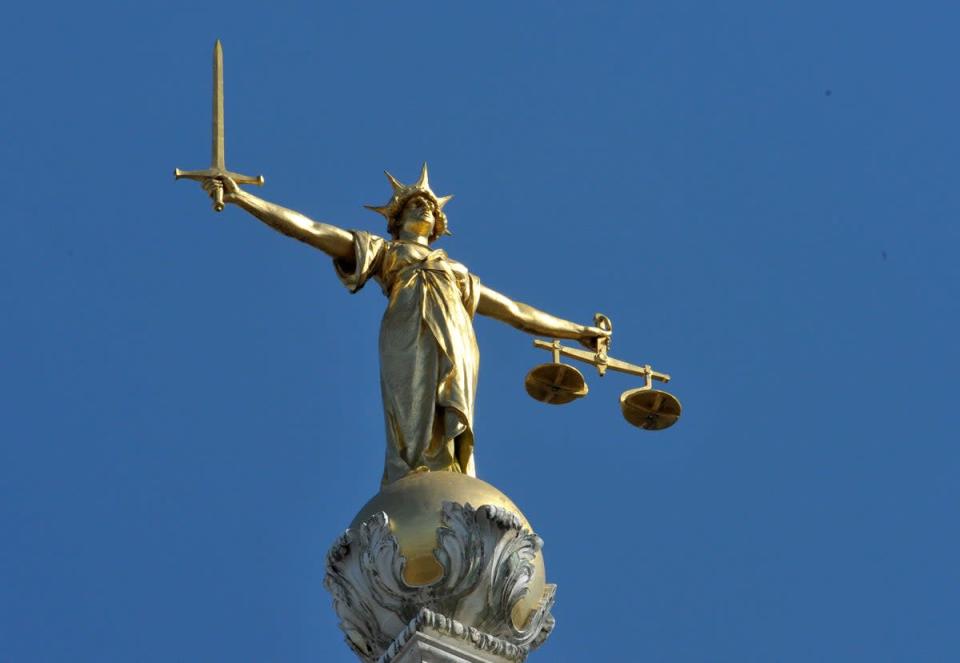 La statue de Lady Justice au sommet de la Cour pénale centrale, également appelée Old Bailey, Londres.  (Nick Ansell/PA) (Archives PA)