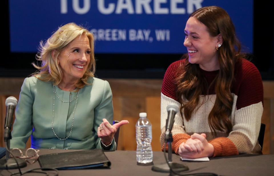 First lady Jill Biden shares a laugh with Mishicot High School senior Katelyn Callahan during a panel discussion on Friday at LiveX in the Rail Yard Innovation District in Green Bay. Biden visited Green Bay to draw attention to efforts to expand career-oriented learning in high school and college.