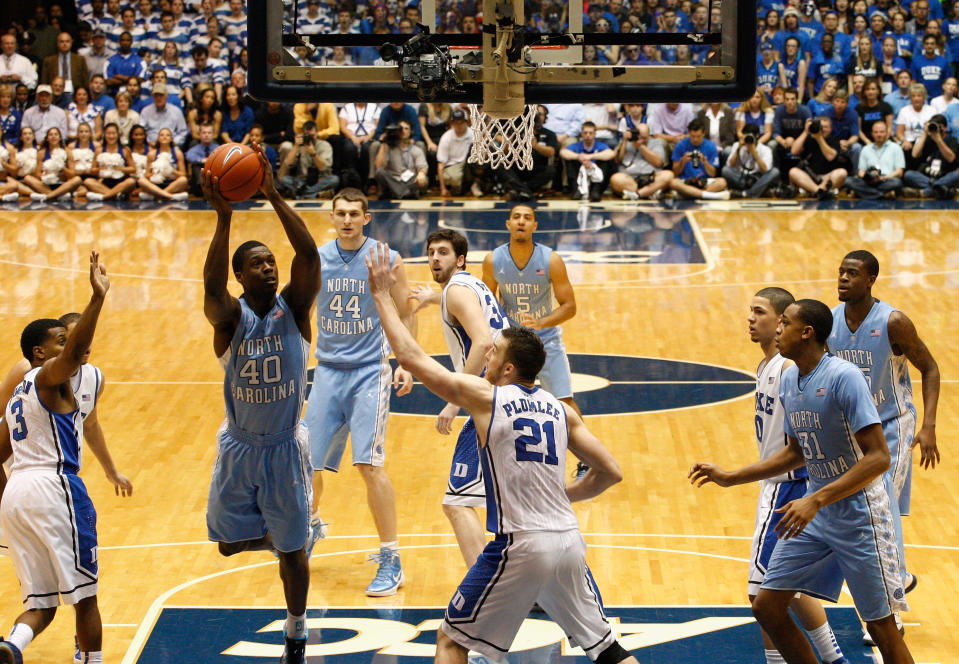 DURHAM, NC - MARCH 03: Harrison Barnes #40 of the North Carolina Tar Heels drives to the basket on Miles Plumlee #21 of the Duke Blue Devils during their game at Cameron Indoor Stadium on March 3, 2012 in Durham, North Carolina. (Photo by Streeter Lecka/Getty Images)