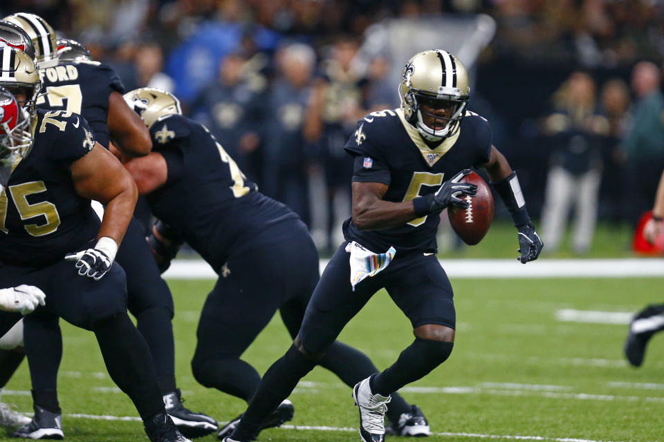 New Orleans Saints quarterback Teddy Bridgewater (5) scrambles under pressure in the first half of an NFL football game against the Tampa Bay Buccaneers in New Orleans, Sunday, Oct. 6, 2019. (AP Photo/Butch Dill)