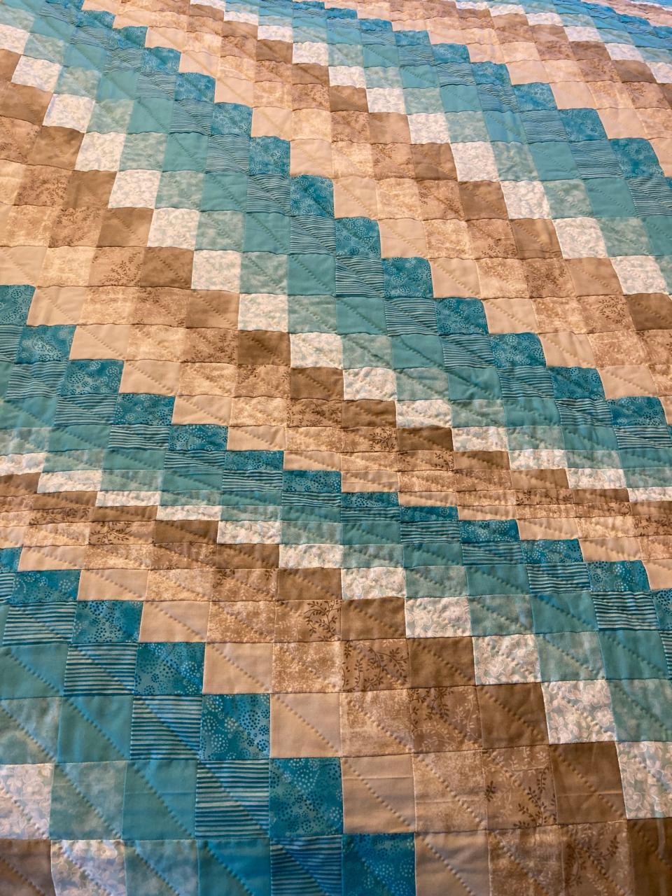 "Surf Song" is one of the featured patterns among the more than 100 quilts in the Art, Craft and Amish Quilt Show taking place July 6 to 9 in Jacksonport.