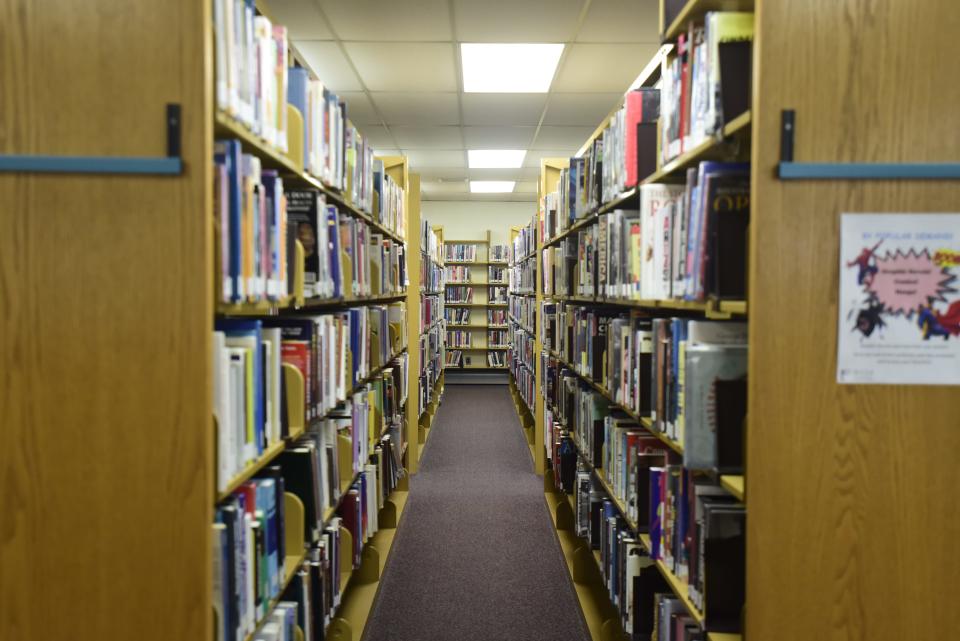A look between the stacks on Friday, May 6, 2022, shows the variety of materials at the St. Clair County Library System's main branch in Port Huron. The branch is up for a roof replacement this year.