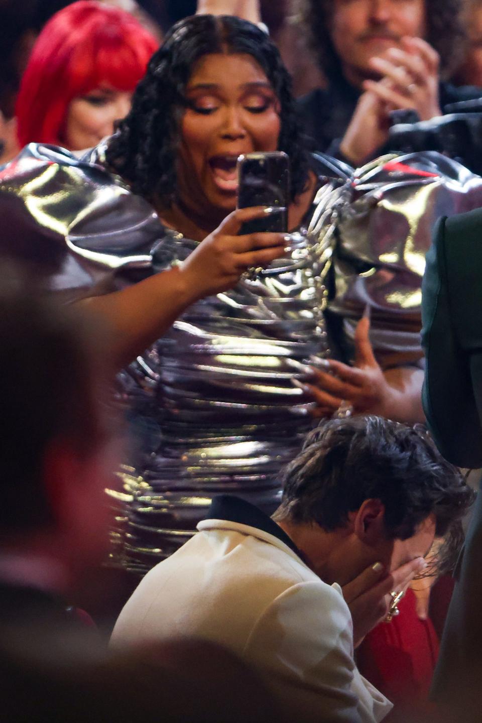 Lizzo reacts as Harry Styles wins album of the year at the 65th Grammy Awards, held at the Crytpo.com Arena on February 5, 2023.