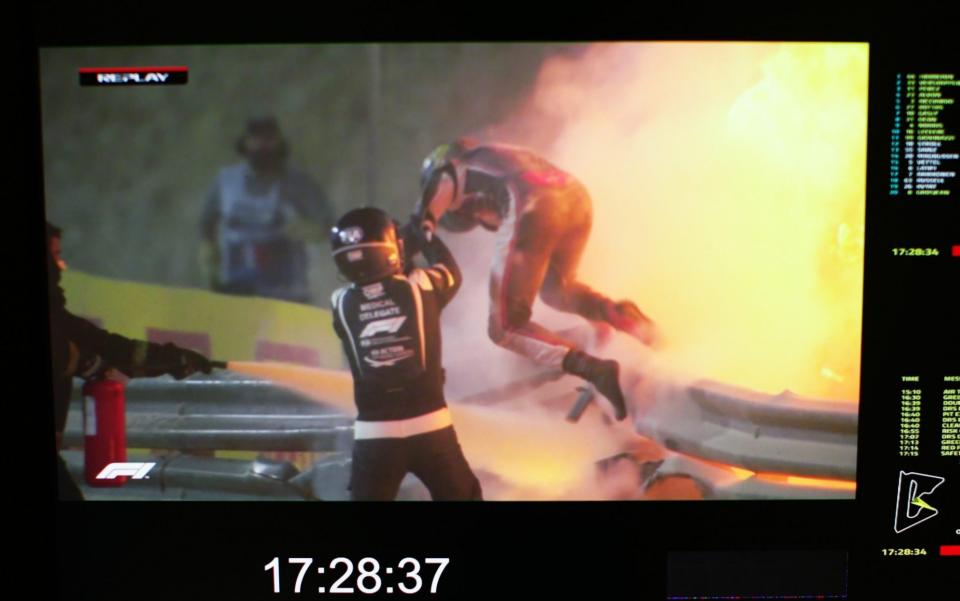 Romain Grosjean of France and Haas F1 is pictured on a screen escaping his crash during the F1 Grand Prix of Bahrain at Bahrain International Circuit on November 29, 2020 in Bahrain, Bahrain - Peter Fox /Getty Images Europe 