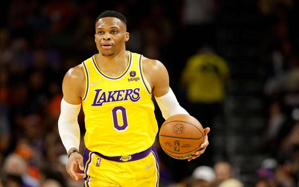 PHOENIX, ARIZONA - APRIL 05: Russell Westbrook #0 of the Los Angeles Lakers handles the ball during the first half of the NBA game at Footprint Center on April 05, 2022 in Phoenix, Arizona.  NOTE TO USER: User expressly acknowledges and agrees that, 
by downloading and or using this photograph, User is consenting to the terms and conditions of the Getty Images License Agreement. (Photo by Christian Petersen/Getty Images)