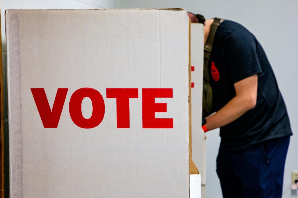 Leo Zuniga fills out his ballot on June 28, 2022, at Together Church in Oklahoma City.