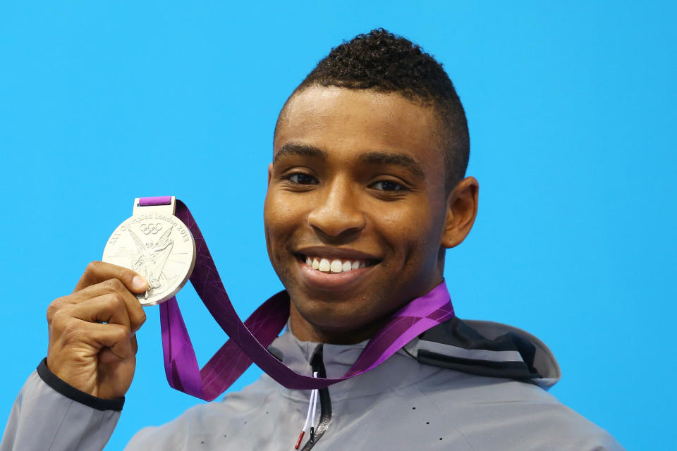 Silver medallist <a href="http://sports.yahoo.com/olympics/swimming/cullen-jones-1237821/" data-ylk="slk:Cullen Jones;elm:context_link;itc:0;sec:content-canvas" class="link ">Cullen Jones</a> of the United States poses on the podium during the medal ceremony for the Men?s 50m Freestyle Final on Day 7 of the London 2012 Olympic Games at the Aquatics Centre on August 3, 2012 in London, England. (Photo by Al Bello/Getty Images)