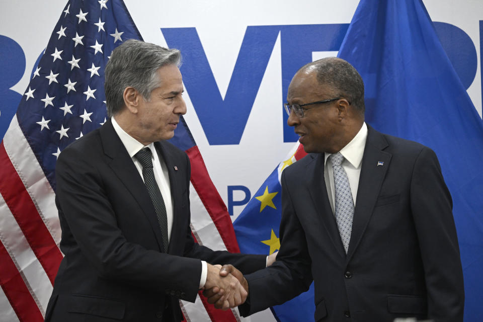 US Secretary of State Antony Blinken, left, shakes hands with Cape Verde Prime Minister Ulisses Correia e Silva, at the Government Palace in Praia, Cape Verde, Monday, Jan. 22, 2024. (Andrew Caballero-Reynolds/Pool Photo via AP)