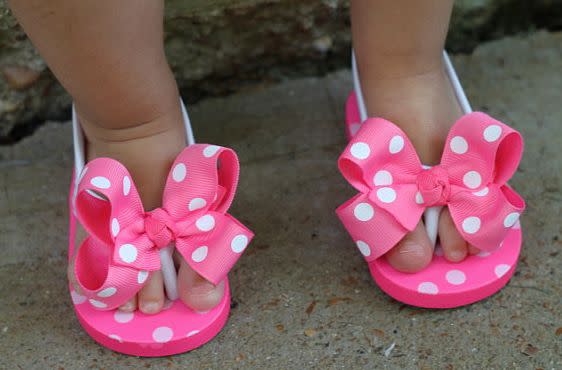 First of all, babies who are not walking yet don't need shoes at all. Second of all, ouch.  <a href="http://www.etsy.com/listing/99995285/baby-girl-flip-flops-infant-flip-flops?ref=sr_gallery_21&ga_search_query=baby&ga_view_type=gallery&ga_ship_to=US&ga_page=8&ga_search_type=all" target="_blank">via Etsy</a>