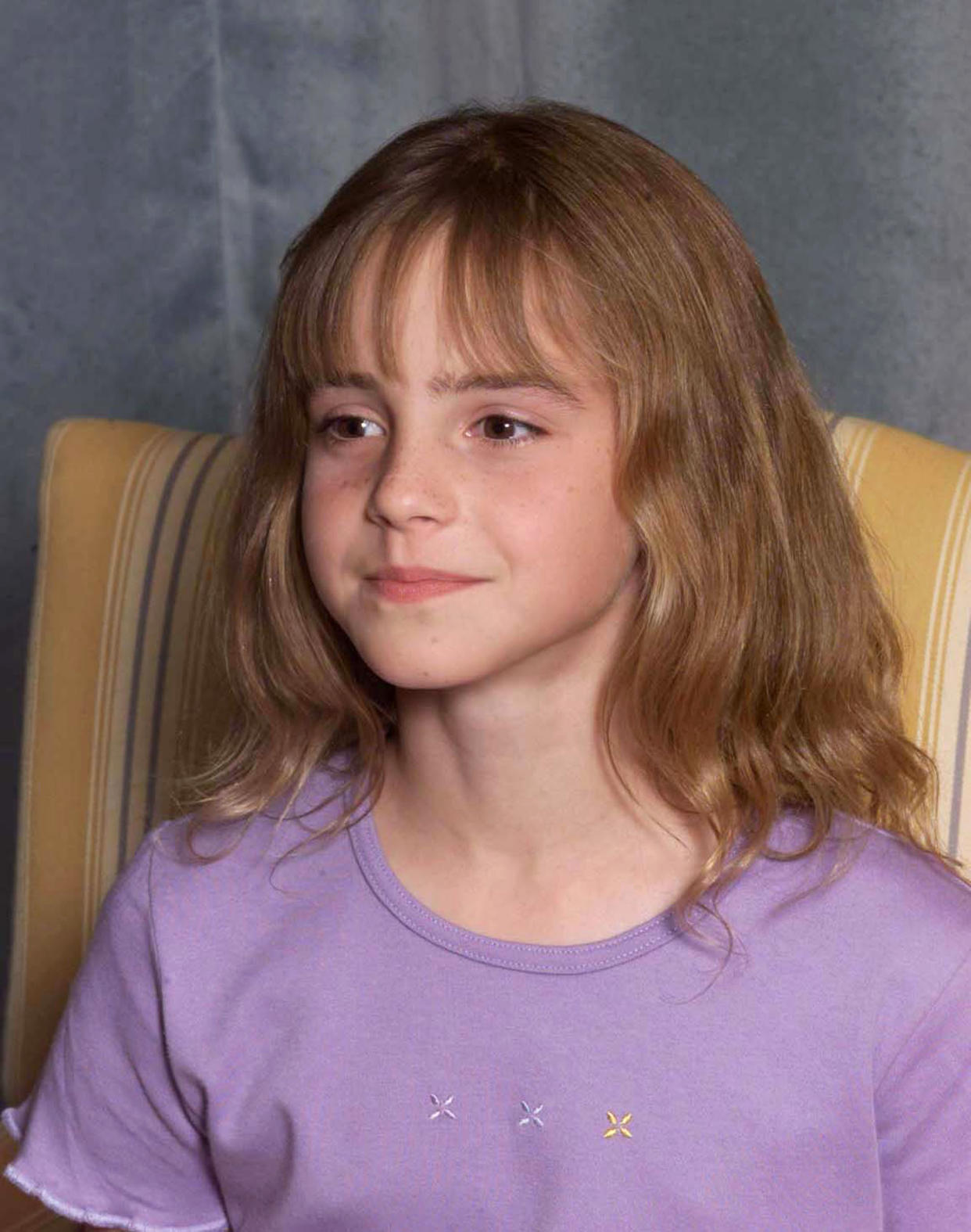 Emma Watson at a photocall to present the new cast of the Harry Potter films in 2000