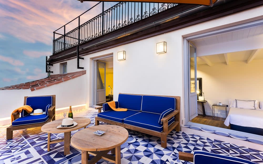 The rooms at Only You Madrid have a pleasing blue-and-yellow colour scheme; some over large private terraces overlooking the city