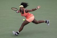 Serena Williams of the U.S. chases down a return to Kiki Bertens of the Netherlands during their second round match at the U.S. Open Championships tennis tournament in New York, September 2, 2015. REUTERS/Adrees Latif