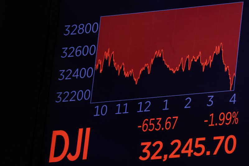 Traders work on the floor of the NYSE in New York