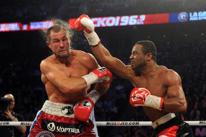 Jean Pascal (R) lands a head shot to Sergey Kovalev during their unified light heavyweight championship bout at the Bell Centre in Montreal on Saturday. (Photo by Richard Wolowicz/Getty Images)