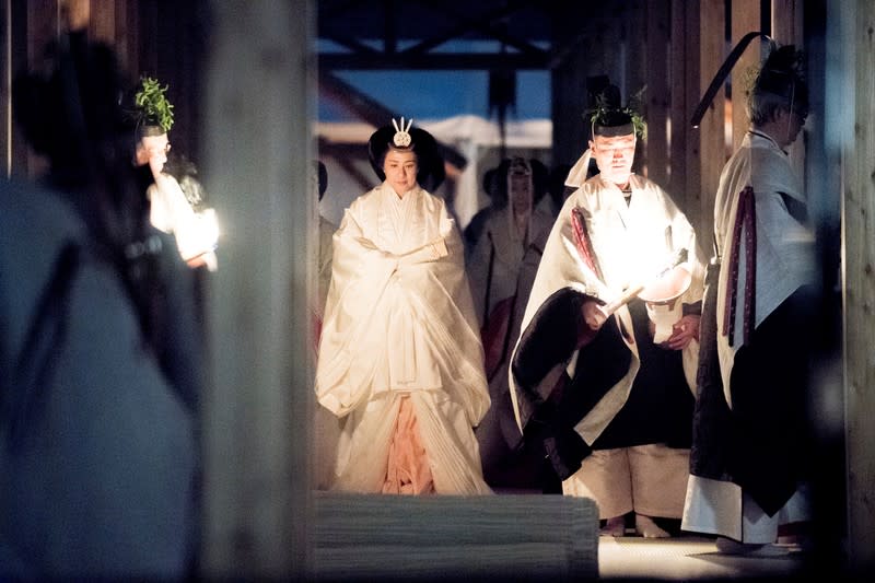 Japan's Empress Masako attends the 'Daijosai', the most overtly religious ceremony of the Emperor Naruhito's accession rituals, at the Imperial Palace in Tokyo, Japan