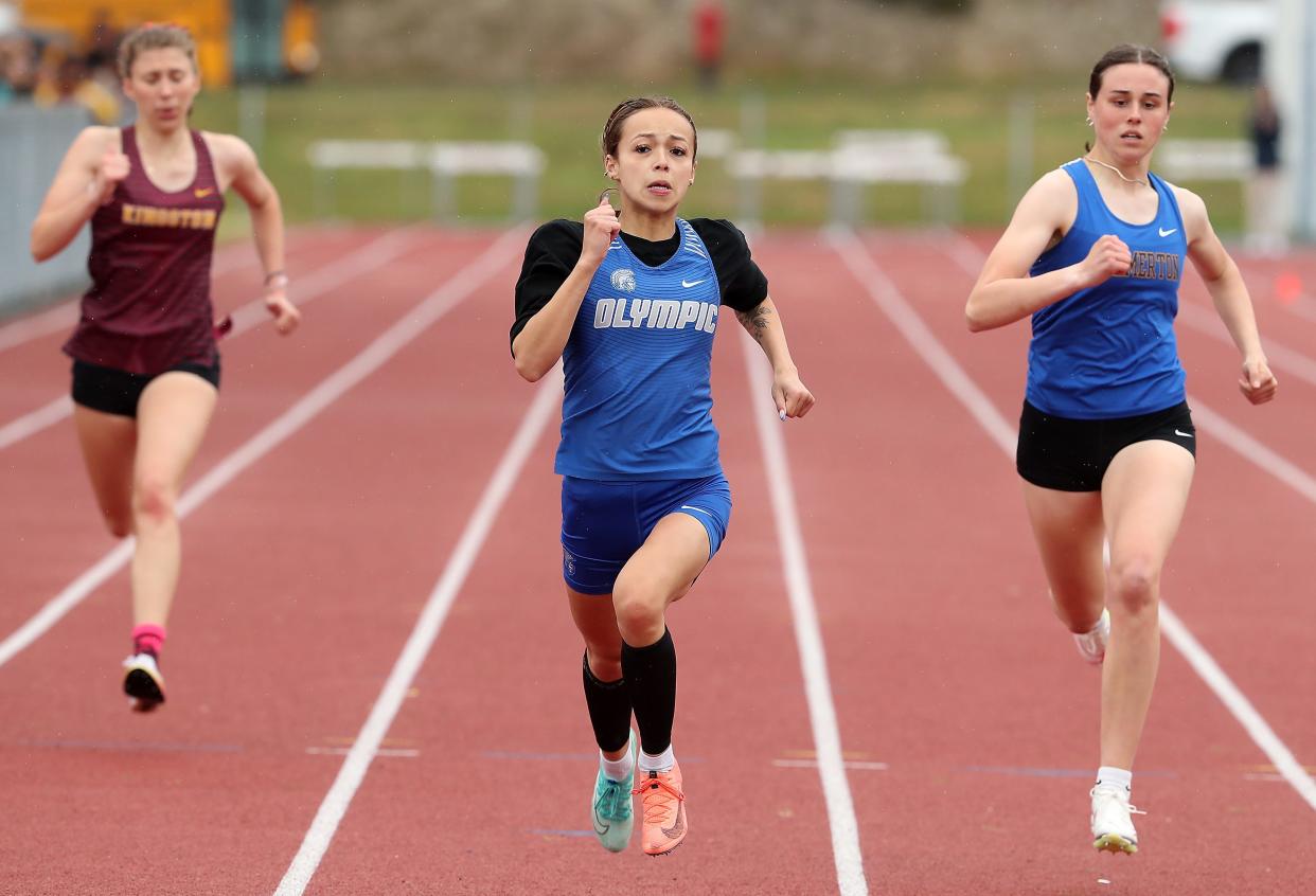 Olympic’s Mia Talarico strides for the finish line of the 200 Meter during the Olympic League Track and Field Championships at North Kitsap High School in Poulsbo on Saturday, May 4, 2024.