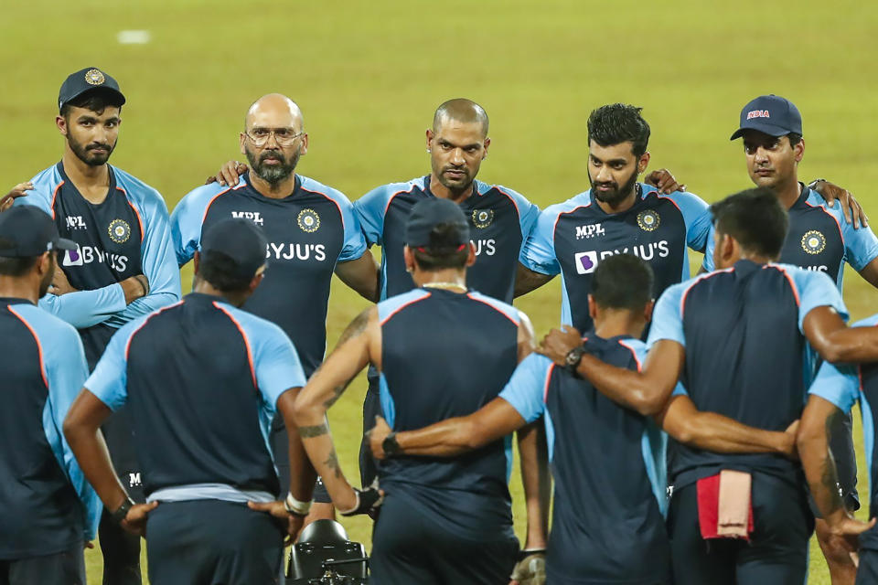 FILE - In this July 29, 2021, file photo, Indian players embrace before the beginning of the third Twenty20 cricket match between Sri Lanka and India in Colombo, Sri Lanka. The pandemic-affected T20 World Cup will finally kick off in Oman and the United Arab Emirates on Sunday, Oct. 17, 2021, with no clear cut favorites this time around. (AP Photo/Eranga Jayawardena, File)