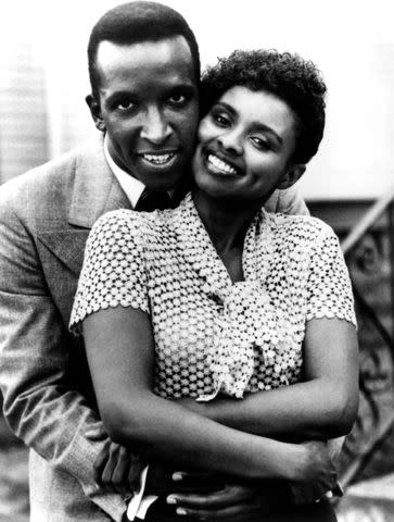 <p>Courtesy Everett Collection</p> Dorian Harewood and Debbi Morgan in The Jesse Owens Story.