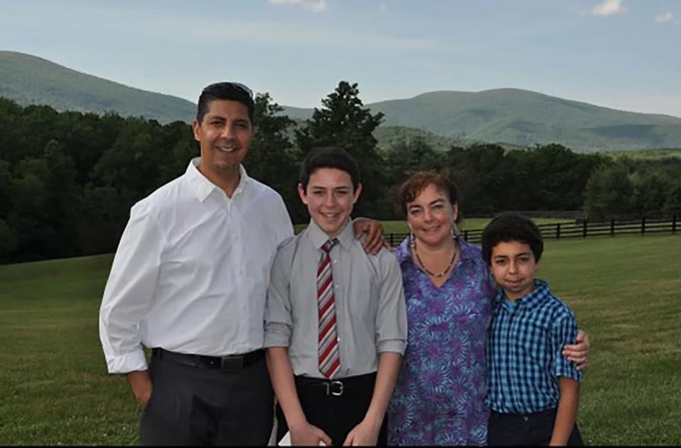 Family photo, featuring l to r, Abdelali Bourzgui, Ali Louis Bourzgui, Rita Giovanetti, and Driss Bourzgui.