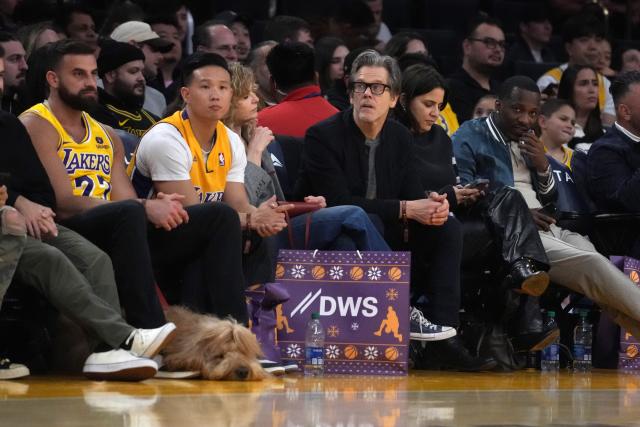 Brodie The Goldendoodle was a crowd favorite sitting courtside at