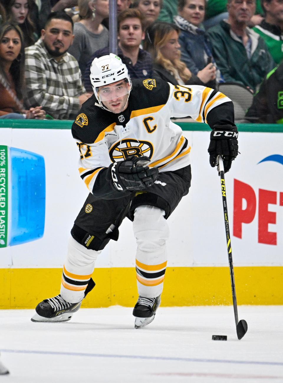 Boston Bruins center Patrice Bergeron (37) in action during the game between the Dallas Stars and the Boston Bruins at American Airlines Center on Feb.  14, 2023.