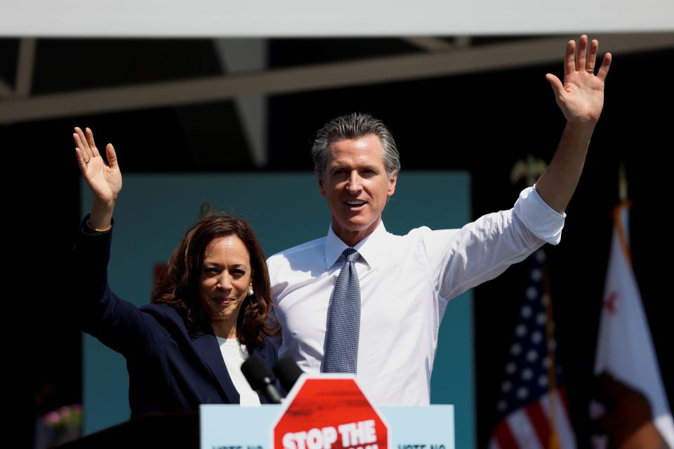 U.S. Vice President Kamala Harris and California Gov. Gavin Newsom wave after Newsom's appearance ahead of the Republican-led recall election in September, in San Leandro, California, U.S., September 8, 2021. Newsom is one of many Democratic figures to endorse Harris in the 2024 election.