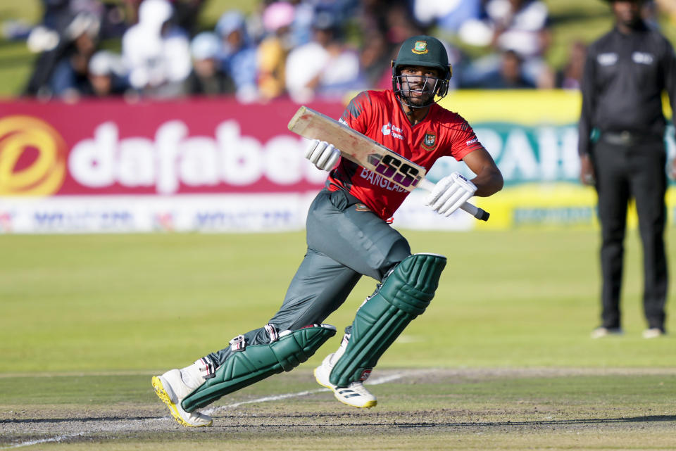 FILE - Bangladesh batsman Najmul Hossain Shanto makes a run on the first day of the T20 match between Zimbabwe and Bangladesh at Harare Sports Club in Harare, Zimbabwe, Saturday, July 30, 2022. Hossain Shanto top scored with 71 runs during the T20 World Cup game against Zimbabwe in Brisbane, Australia, Sunday, Oct. 30, 2022. (AP Photo/Tsvangirayi Mukwazhi/Fle)