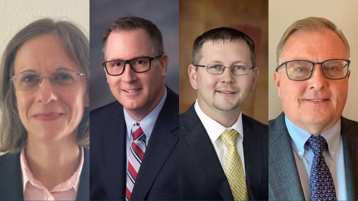 The four finalists to be Topeka's next city manager are, from left, Abbe Yacoben, Stephen Wade, Mike Harmon and David Johnson.