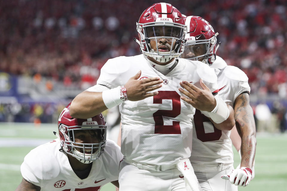 Could Jalen Hurts (2) end up at UCLA after Alabama gets past the College Football Playoff? (AP)