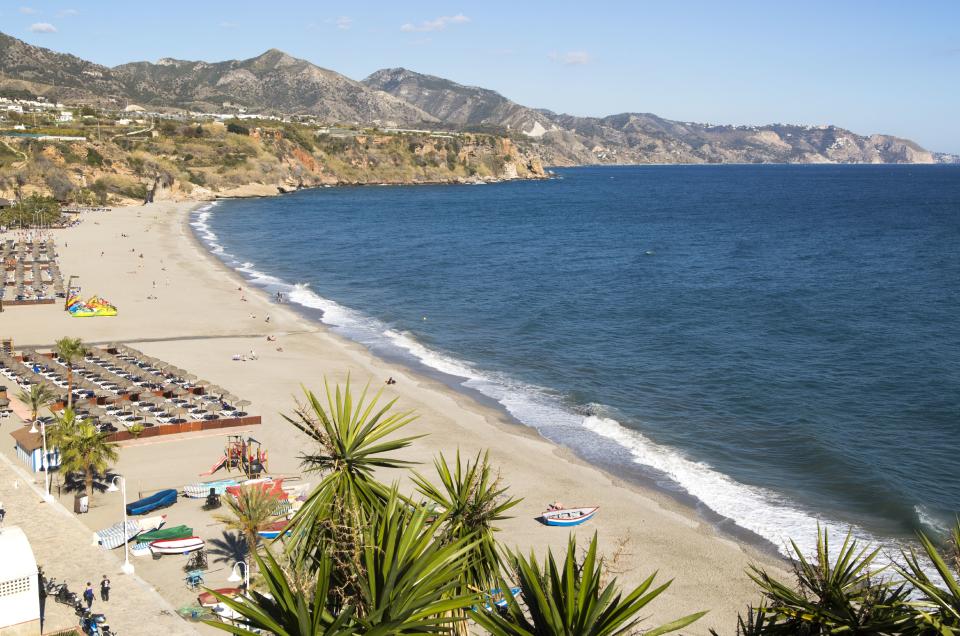 Playa Burriana sandy beach at popular holiday resort town of Nerja, Malaga province, Spain. (Photo by:  Geography Photos/Universal Images Group via Getty Images)