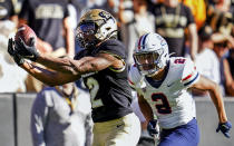 Colorado wide receiver Brenden Rice, left, hauls in a touchdown pass against Arizona during an NCAA college football game Saturday, Oct. 16, 2021, in Boulder, Colo. (AP Photo/Geneva Heffernan)