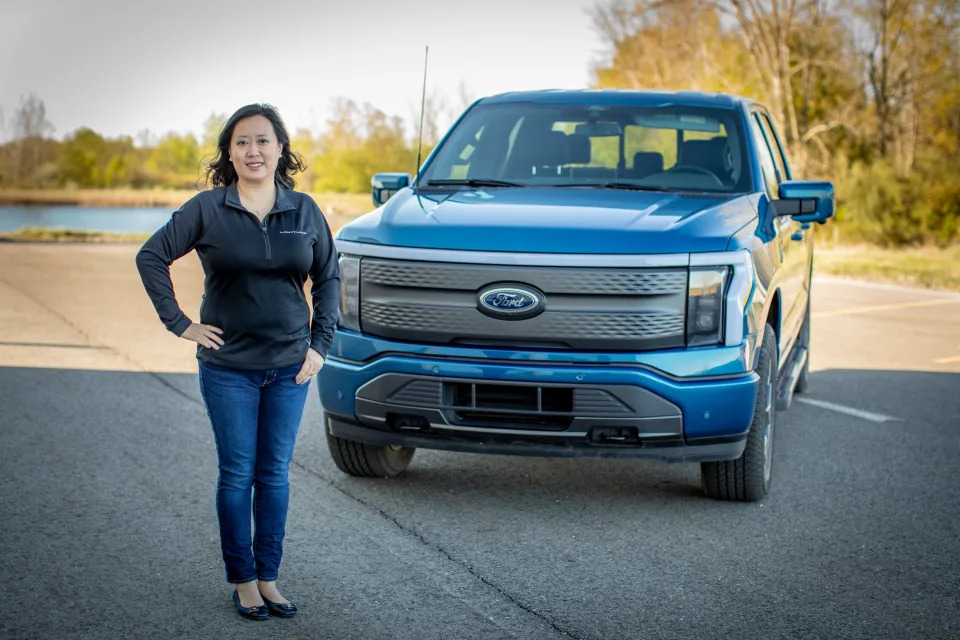 Linda Zhang stands in front of a F-150 Lightning.