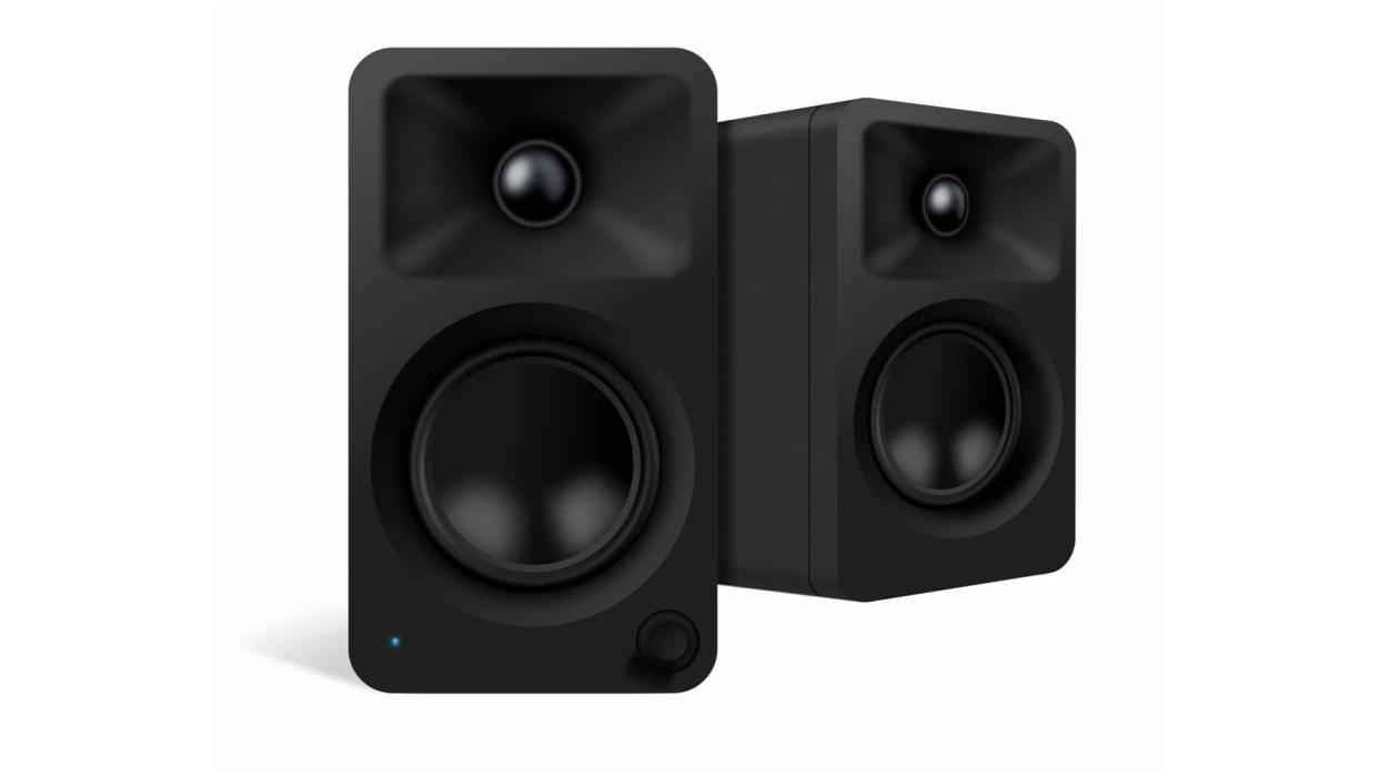  Black Kanto Audio ORA 4 desktop speakers on a white background. 